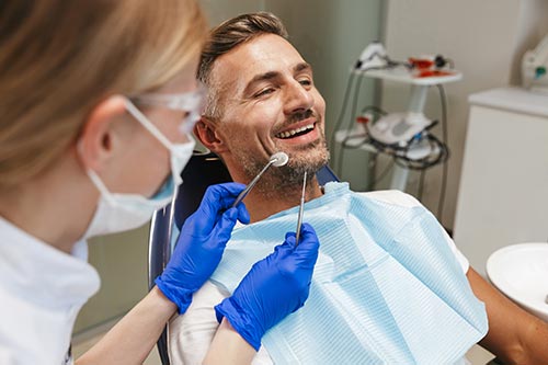 middle-aged-man-in-dentists-chair